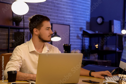 Handsome young man working ...