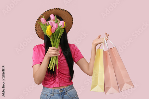 Young woman with shopping b...