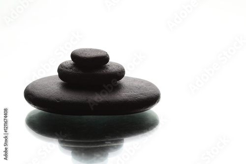 stack of stones on white background 