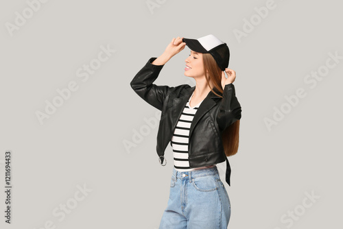Beautiful young woman in st...