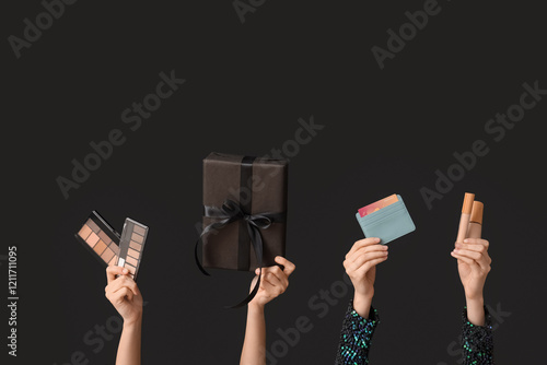 Female hands with gift box,...