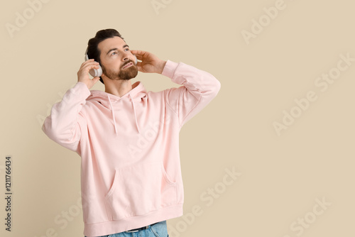 Handsome man in headphones ...