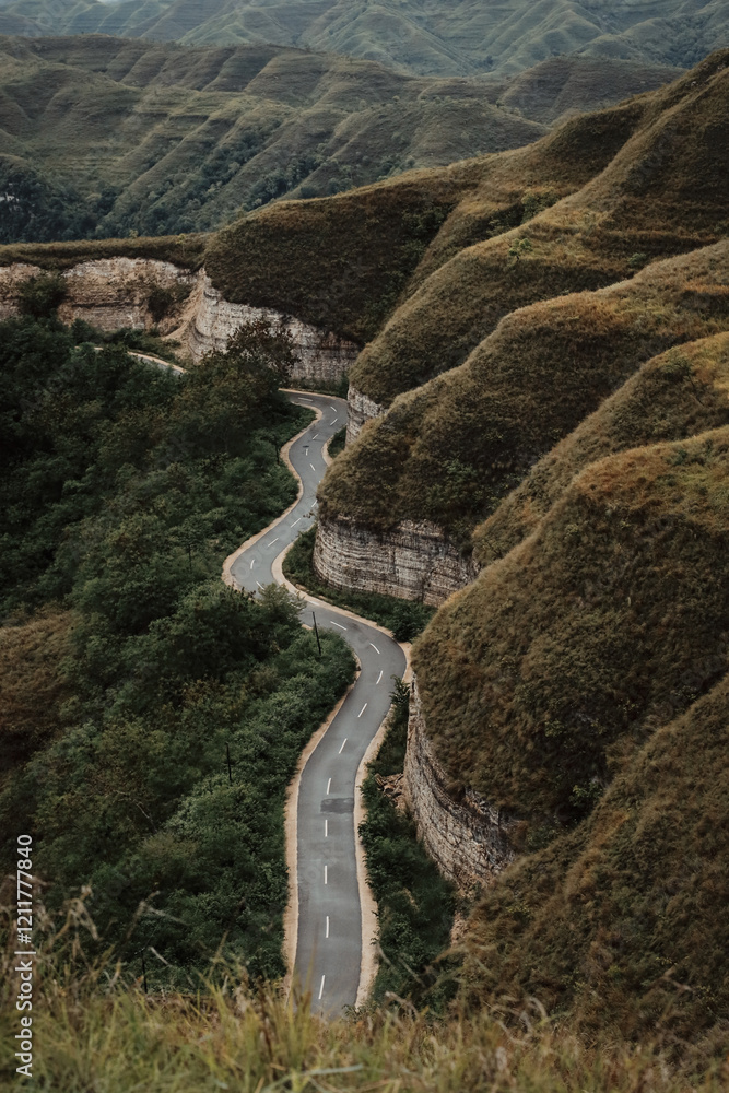 Fototapeta premium The road winds over the hills at Sumba, Indonesia