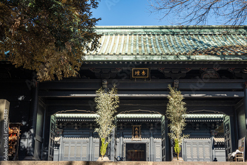 Yushima Seido temple, building exterior of the Japanese temple in Bunkyo city in Tokyo outdoor at daytime during winter in Japan (Japanese translation : Taiseiden Main hall). photo