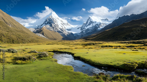 Majestic snow-capped Andes mountains reflecting in a tranquil stream, valley landscape, travel destination photo