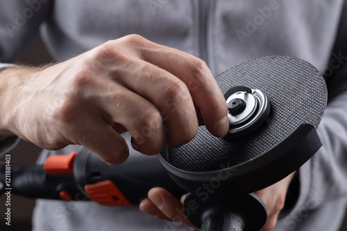 Tableau sur toile Replacement of the grinding wheel of electric grinder