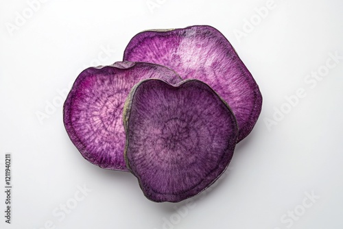 Fresh purple yam slices, isolated, white background, high-contrast food photography photo