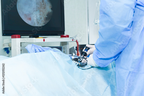 urological surgery, urologist examination, endoscope, lithotripsy, ureteral stone removal, operating room, doctors, hospital, medical instruments photo