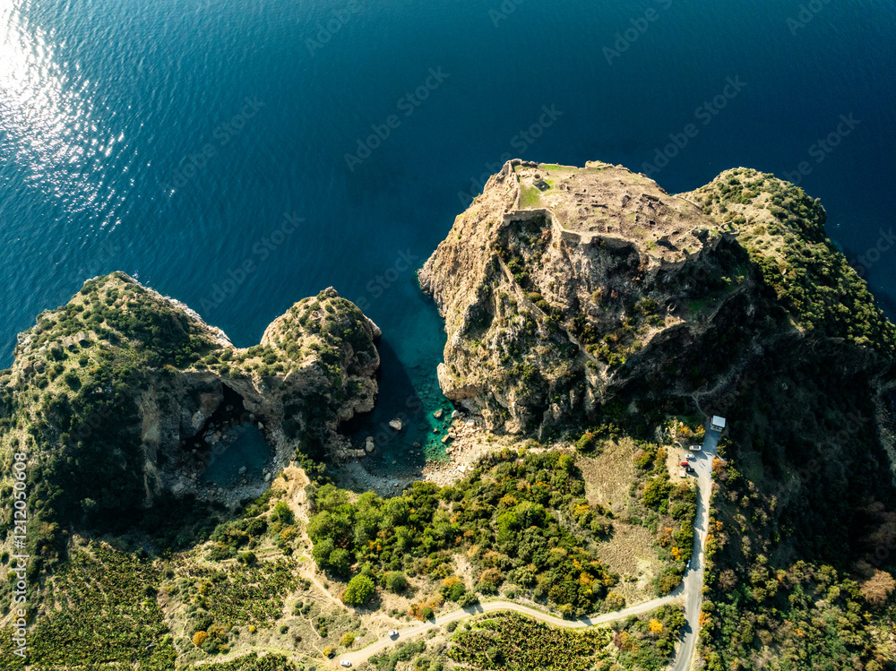 Aerial view from above of Kings Bay on the Mediterranean coast of Turkey with a fortress on one of the peninsulas