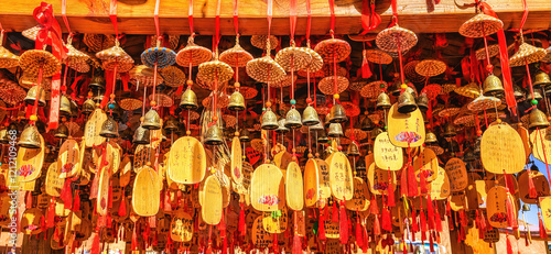 Wish bells at a pavilion in Zhangye, Gansu Province, China photo