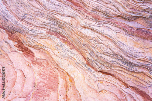 Detailed red rock formations with intricate natural lines photo