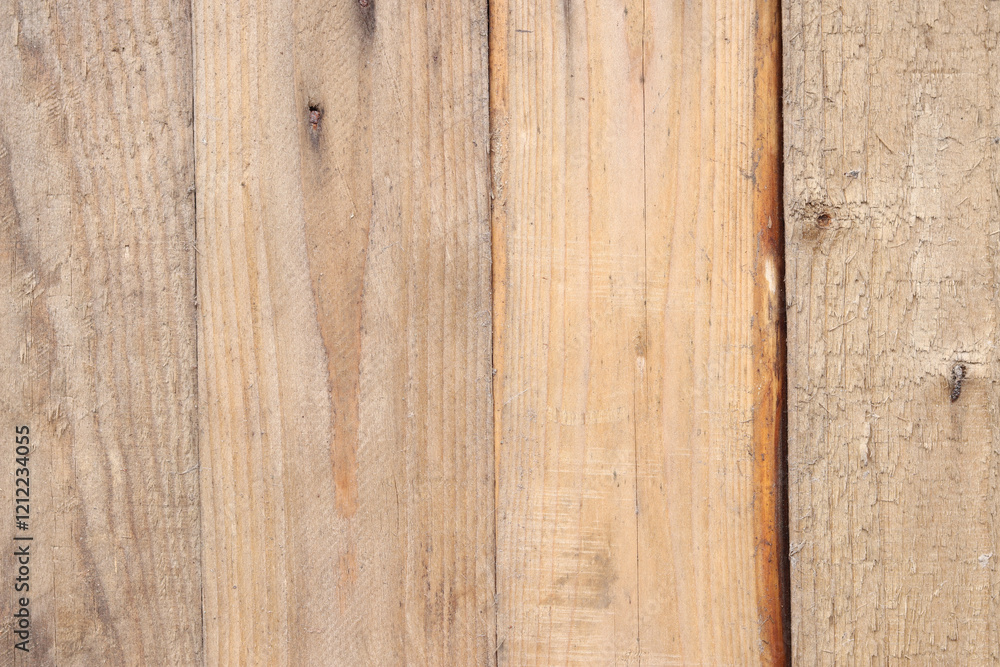Fototapeta premium Background of wooden planks nailed together. Background of old planks nailed together with metal nails, close-up. Texture