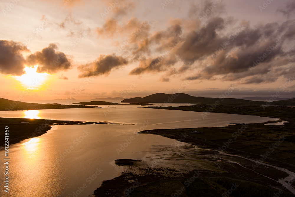 Fototapeta premium Aerial sunset view of Derreen river along the Ring of Kerry route. Rugged coast of on Iveragh Peninsula on sunset, Ireland.