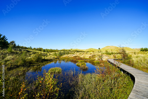 Fotografie View of the landscape and a body of water on the North Frisian island of Amrum