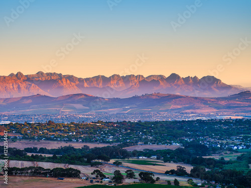 Scenic sunset view of Durbanville and Tyger Valley with the majestic Simonsberg and Stellenbosch Mountain range in the background photo