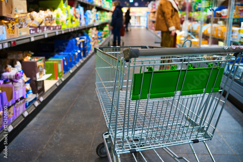 Shopping cart in a supermarket. Selective focus.