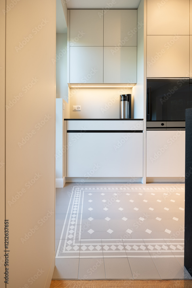 Fototapeta premium minimalistic perspective of a bright modern luxury clean kitchen