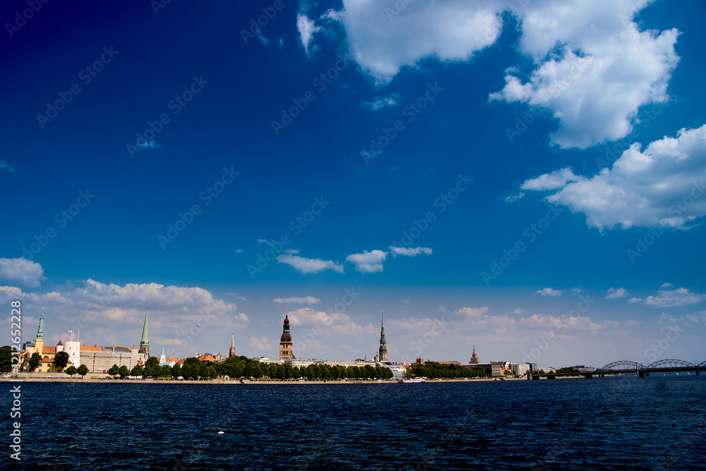 Panorama of Old Riga across the River Daugava against the blue sky Panorama of Old Riga across the River Daugava against the blue sky