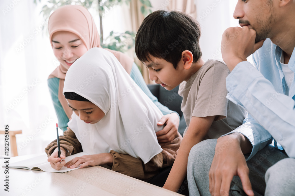 Asian Islamic family, parents and children bonding at home, reading the Quran, embracing traditional values, celebrating Ramadan in a relaxed indoor environment. Asian Islamic family, parents and children bonding at home, reading the Quran, embracing traditional values, celebrating Ramadan in a relaxed indoor environment.