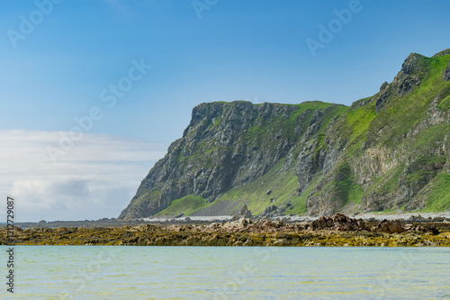 Five Finger Strand, one of the most famous beaches in Inishowen known for its pristine sand and rocky coastline with some of the highest sand dunes in Europe, county Donegal, Ireland. photo