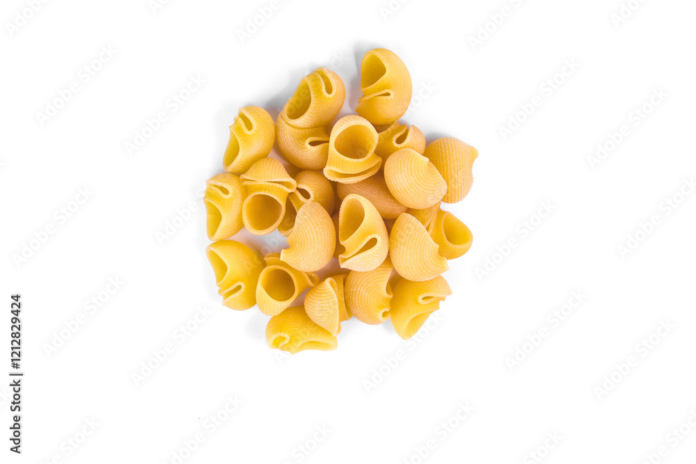 Close-up of shell-shaped pasta (conchiglie) placed on a white background. Close-up of shell-shaped pasta (conchiglie) placed on a white background.