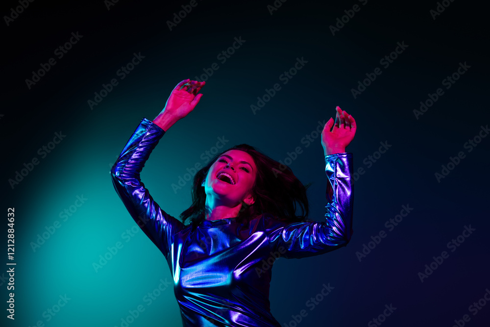 Φωτογραφία Photo of gorgeous young girl have fun dancing wear shiny dress neon light dark b