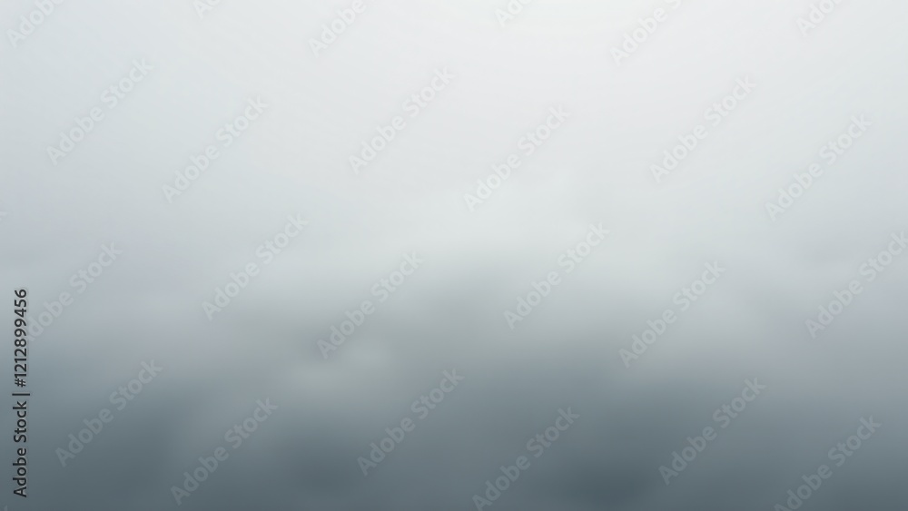 Fototapeta premium Stratus clouds form a uniform gray layer, creating a dense, fog-like atmosphere in the sky. Smooth, featureless textures evoke calm and introspection in this low-altitude scene.