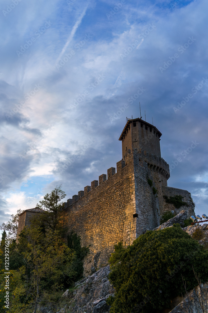 Fortress of Guaita under a cloudy blue sky in San Marino Fortress of Guaita under a cloudy blue sky in San Marino