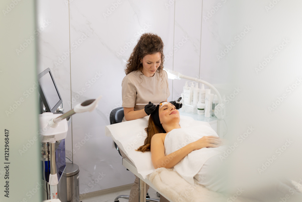 Fototapeta premium Relaxation and rejuvenation in a serene spa setting with expert treatment and soothing ambiance