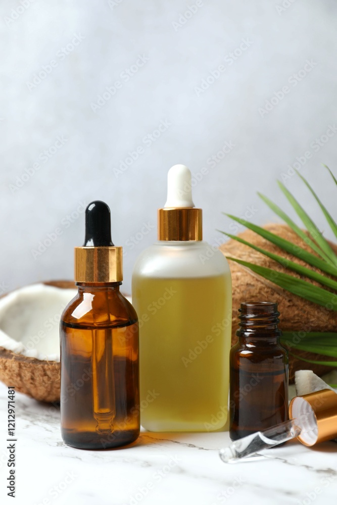 Bottles of coconut oil on the table Bottles of coconut oil on the table