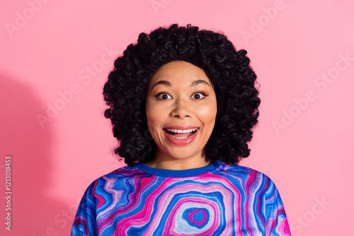 Photo of impressed cheerful cute woman wear trendy jumper good mood isolated on pink color background photo