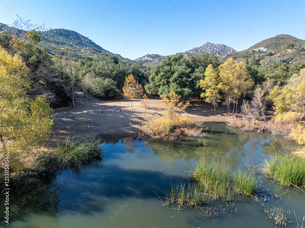 Aerial view of small lake in the in the valley of Dos Picos County Park in Ramona, South California, USA