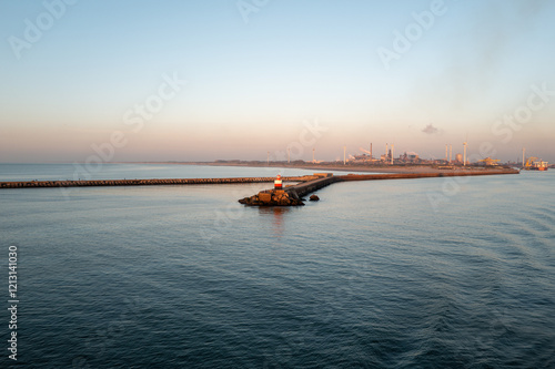 sunset over the sea with lighthouse