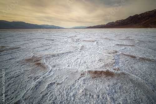 Shadows and textures are highlighted by the evening light at Death Valley’s Badwater Basin salt flats in California.