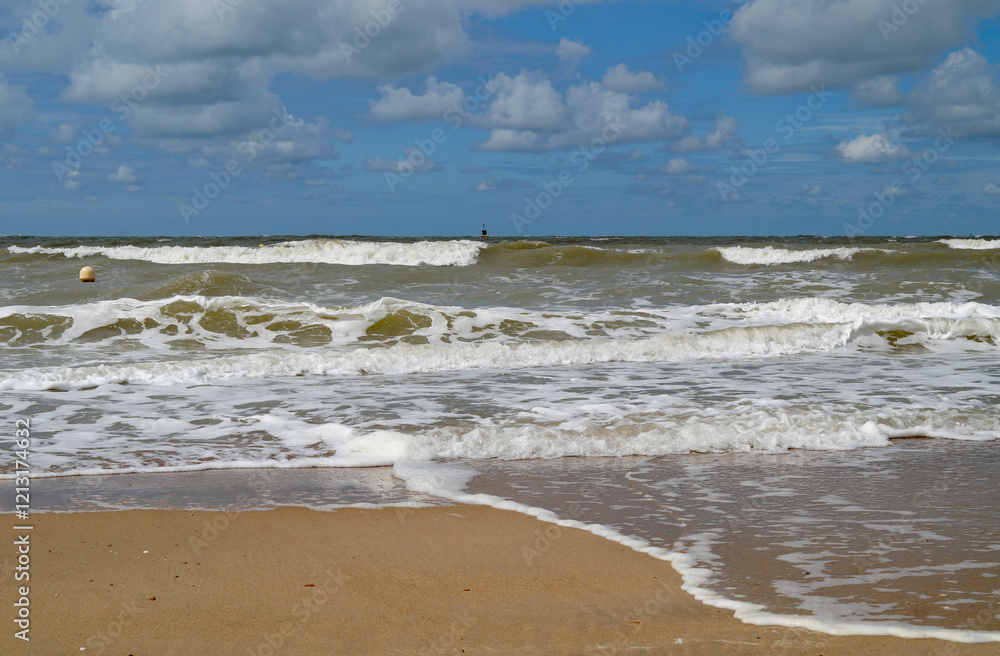 scenic maritime view of the North Sea with its foamy waves and fine-sand beaches of the Belgian city Ostend (Oostende, Belgium) scenic maritime view of the North Sea with its foamy waves and fine-sand beaches of the Belgian city Ostend (Oostende, Belgium)