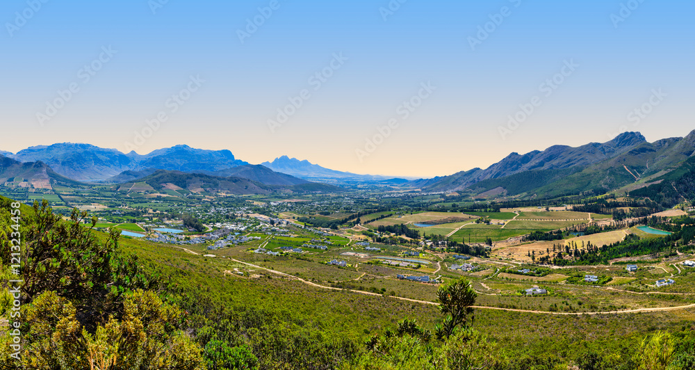 Wide-angle view of the scenic Franschhoek Valley surrounded by majestic mountains, Franschhoek, South Africa
