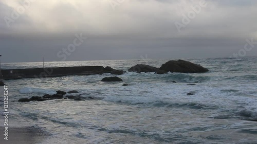 Storm in Italy, Sicilia. Big waves in sunny or cloudy day.