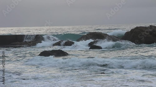 Storm in Italy, Sicilia. Big waves in sunny or cloudy day.