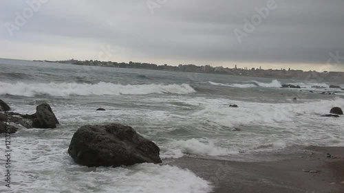 Storm in Italy, Sicilia. Big waves in sunny or cloudy day.
