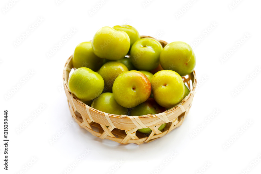 Fresh green plum on white background