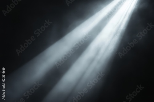 Dramatic light beams cut through smoky darkness. Ideal for adding mood, mystery, or hope to designs. photo