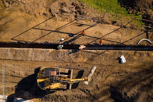 Earthworks and construction on job site at development project photo