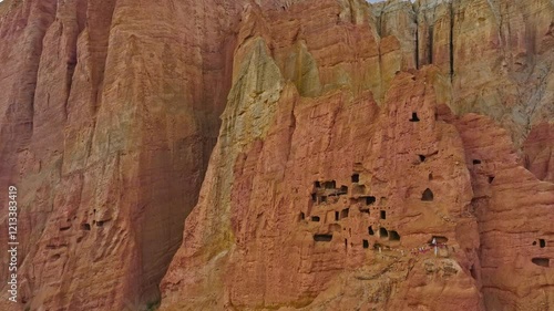 Cave Dwellings With Prayer Flags Preserved In Upper Mustang's Cliffs