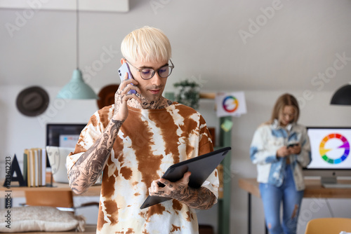 Male graphic designer with ...