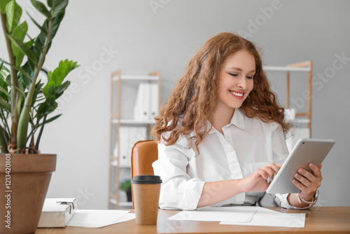 Young businesswoman working...