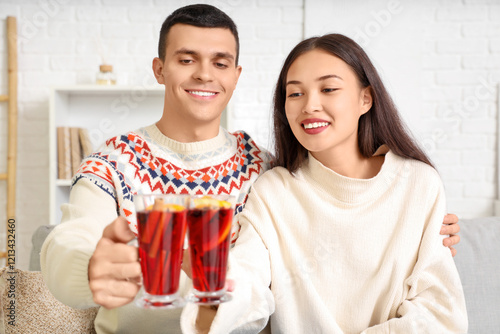 Happy couple with glasses o...