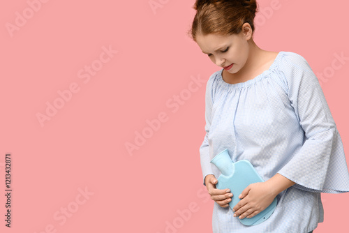 Young woman with hot water ...