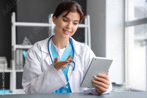 Female doctor video chattin...