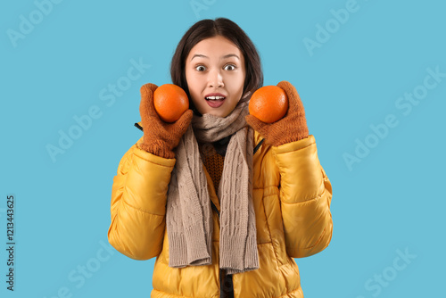 Surprised young woman in wi...