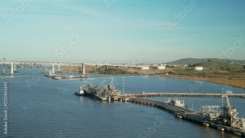 Wallpaper Mural Aerial wide overview of industrial maritime infrastructure and bridges along Carquinez Strait wetlands and shoreline in Martinez, California, with hills Torontodigital.ca
